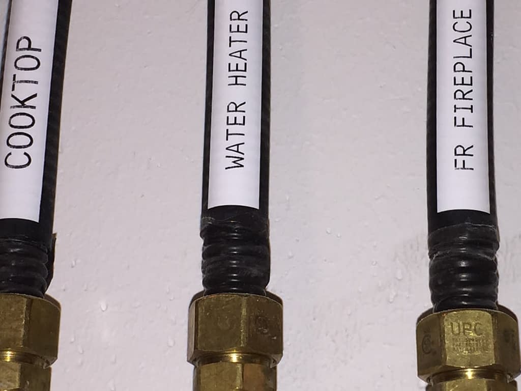 Close up of three different connected gas lines