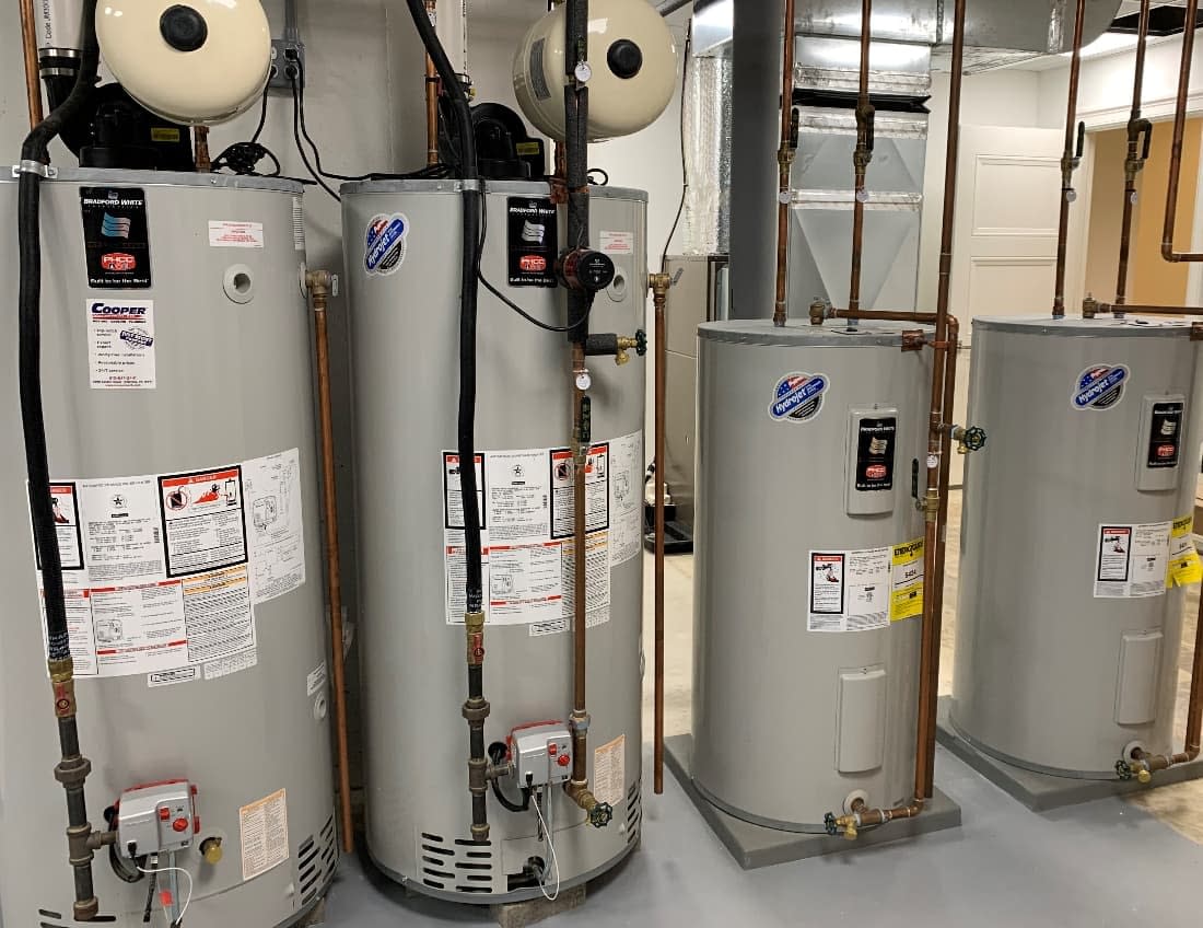 Row of water heater units installed in room