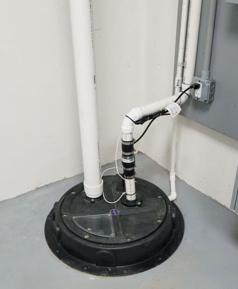 fully installed sump pump in basement