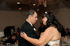 Father and Daughter Dancing at an Event