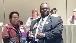 Northwestern College's HIT Faculty Member Christopher Wheat was recently honored with the ILHIMA 2015 Outstanding New Professional Award, shown here at the state awards ceremony with ILHIMA Immediate Past President Theresa L. Jones.