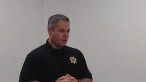 Detective Daniel Matuszak speaks to Northwestern College's Criminal Investigation's Class as part of a partnership between the College and Police Department designed to share real life law enforcement experiences with students
