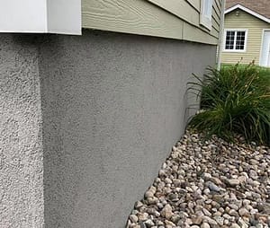 cement stucco foundation on house