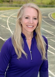 Doctor Christine Foss in Purple Shirt