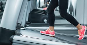 Woman Running on Inclined Treadmill