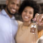 First time home buyers holding keys
