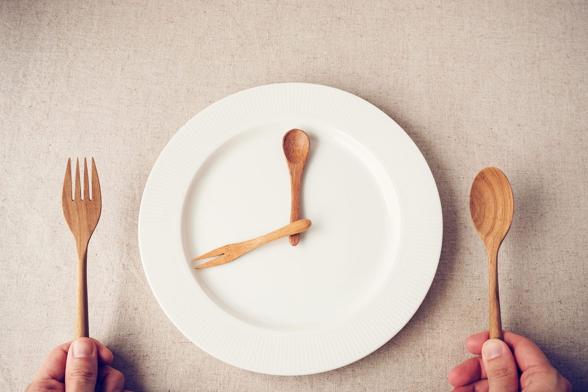 white plate with spoon and fork, Intermittent fasting concept, k