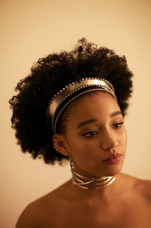 girl with natural hair in headband