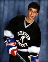 Childhood photo of Jeremy Fishman in hockey uniform
