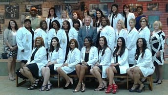 Northwestern College's Violet L. Schumacher School of Nursing Class of 2015, pictured here prior to their Pinning Ceremony with College President Lawrence Schumacher and the Administration & Faculty of the School of Nursing.