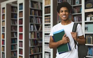 Eager Student Ready To Study In Library