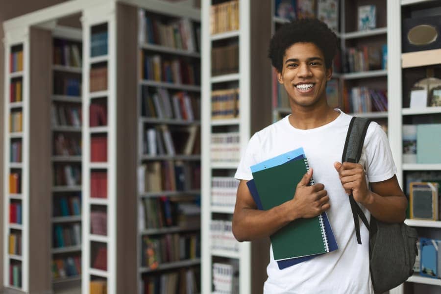 Eager Student Ready To Study In Library