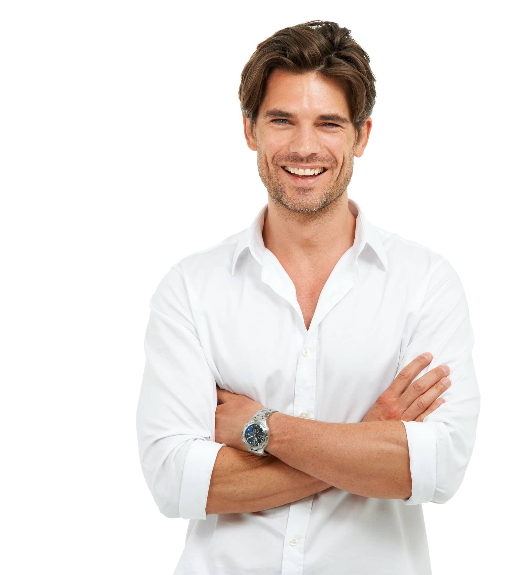 Studio shot of a handsome man standing with his arms crossed and laughing isolated on white