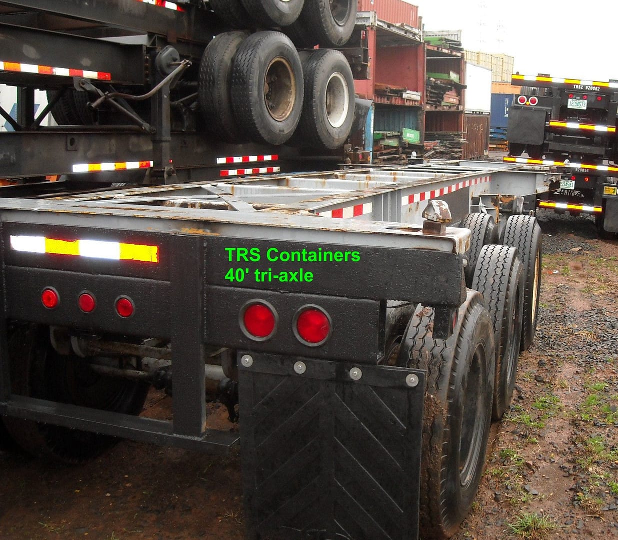 TRS Containers sells rents repairs regsiters stacks and trucks 40 foot tri-axle chassis