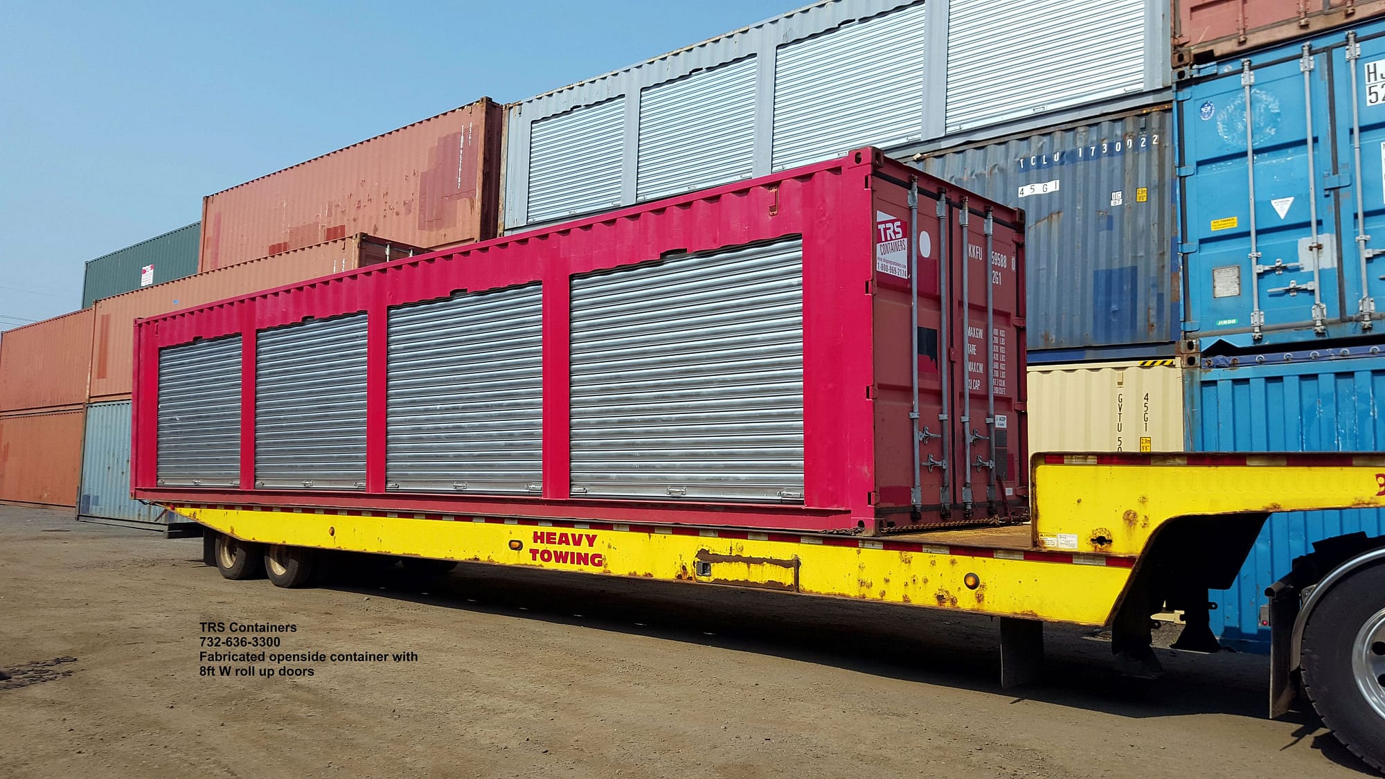 TRS Containers adds heavy duty 20 gauge roll up doors and ships out on a tiltbed truck