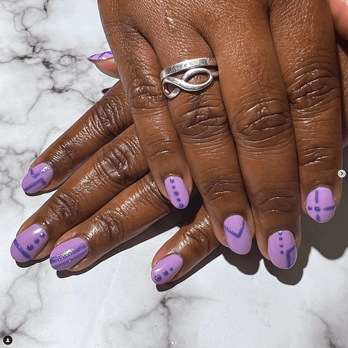 Nail art, two shades of purple, geometric patterns