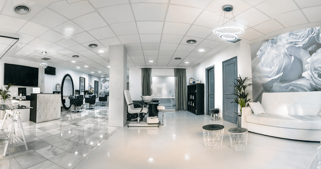 Clean, white, minimalist salon interior.