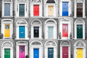 Grid of 18 colorful doors