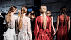 Four aveda models with their hair pulled into low knotted ponytails.