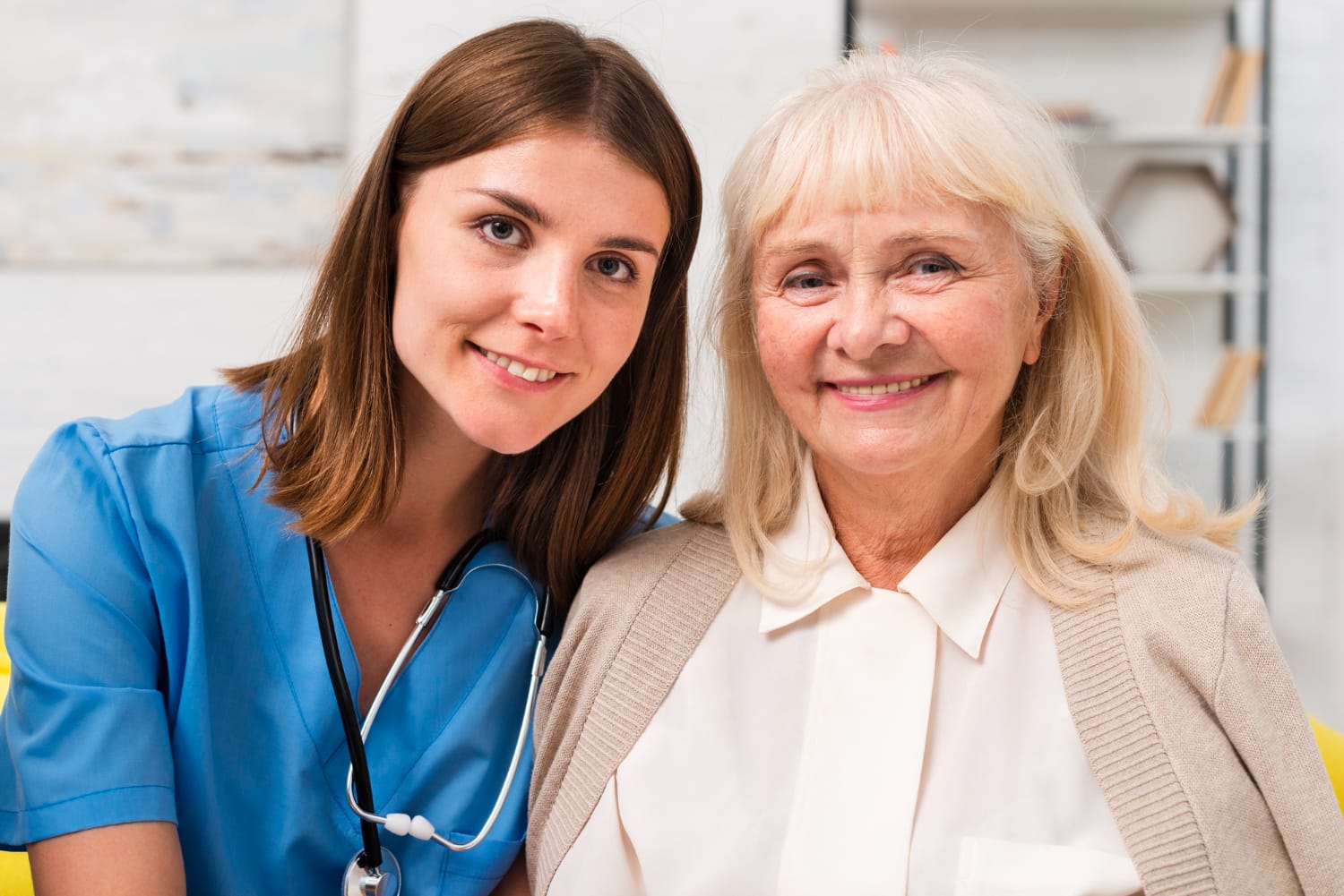 Senior woman smiling with nurse
