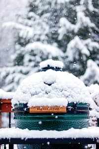 Big-Green Egg grill covered in snow