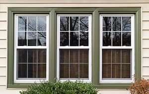 Three new replacement windows with green trim