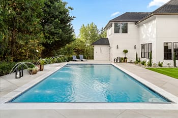 Custom pool in residential backyard designed with computer-assisted software 