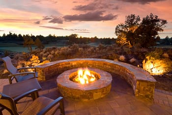 Stone firepit in front of an evening sky