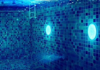 Swimming pool with underwater LED lights