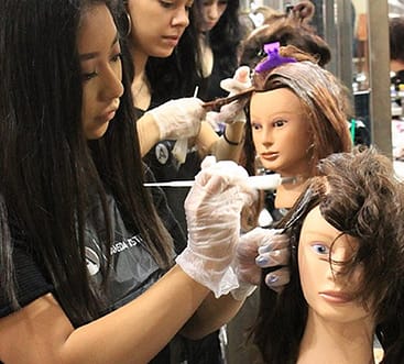 aveda las vegas students practicing hair coloring