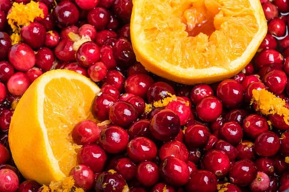 Cranberries and orange for making homemade cranberry sauce