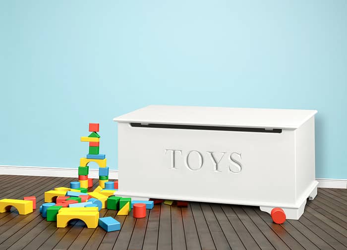 White toy chest with interior storage