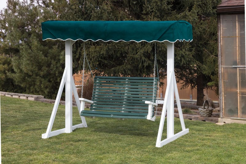 A white-and-green lawn swing with a canopy