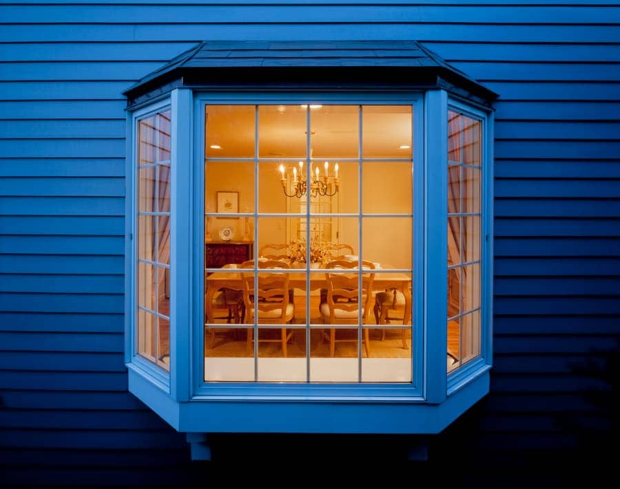 Blue house with bay window and dining room